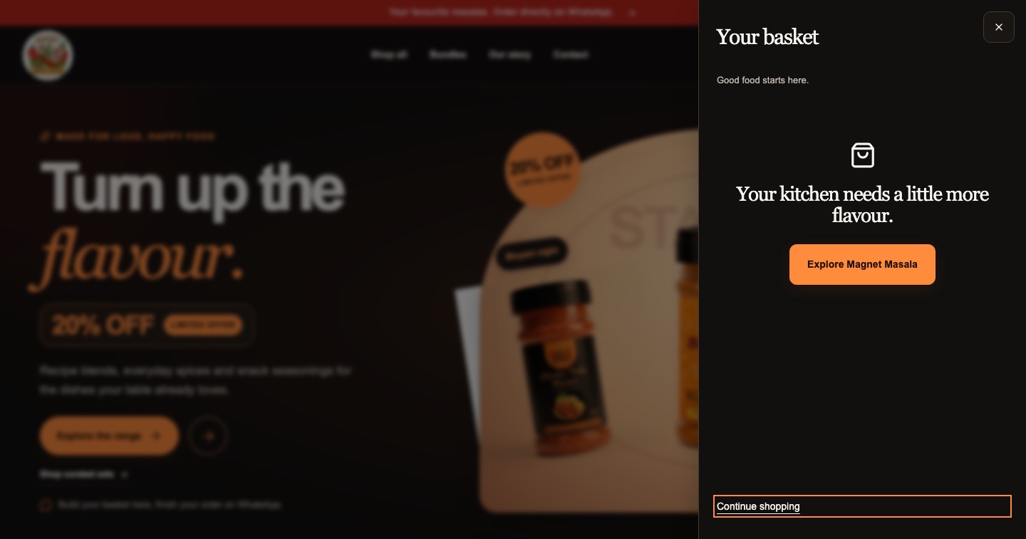 Magnet Masala desktop homepage with the empty basket drawer open.